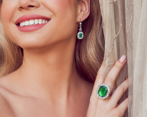 Estate antique emerald and diamond halo jewelry