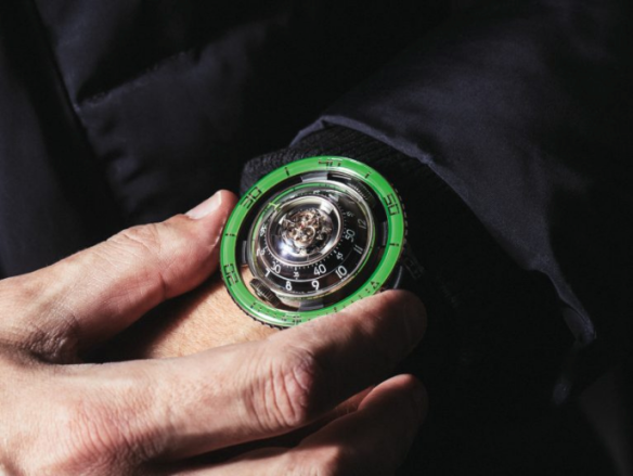 Inspired by jelly fish, the newest MB&F HM7 Aquapod is crafted in titanium with Green bezel.