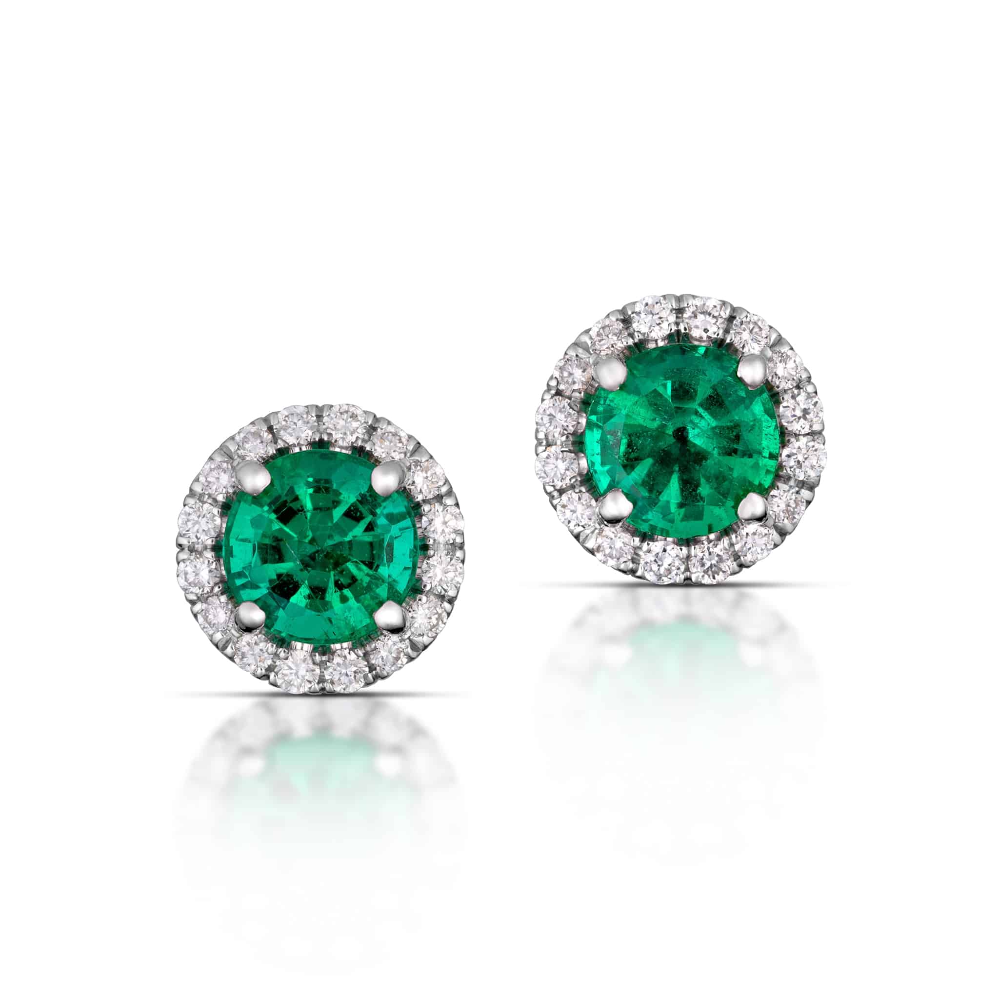 White gold top and emerald earrings