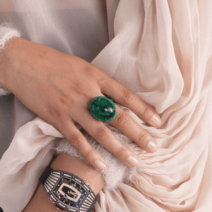 Cabochon Emerald and Tsavorite Garnet Halo Ring